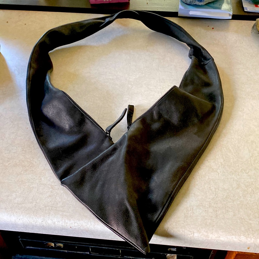 Trippen leather purse.  Never used.  Brand new no tags.  Paid 400.00